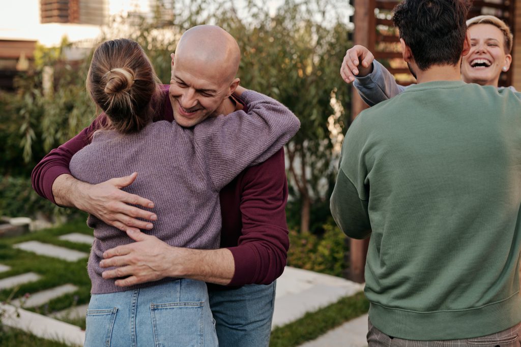 hugging friends